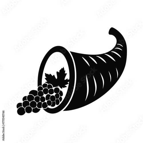 Cornucopia filled with grapes and a leaf horn of plenty