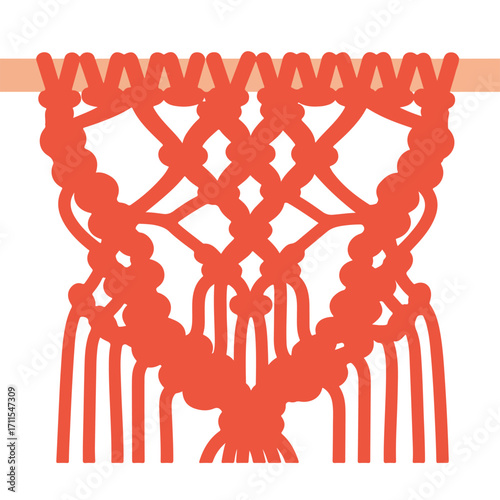Red-orange macrame wall hanging with square knots on a light brown stick