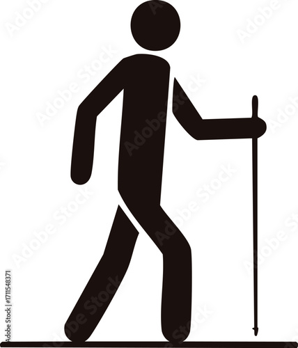 Silhouette figure of a person walking with a walking stick, representing hiking.