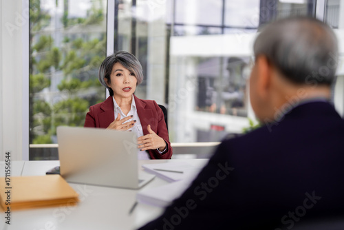 Wallpaper Mural Asian Adult Woman Lawyer Explaining Legal Matters Client Professional Office Meeting Consultation Serious Discussion Torontodigital.ca