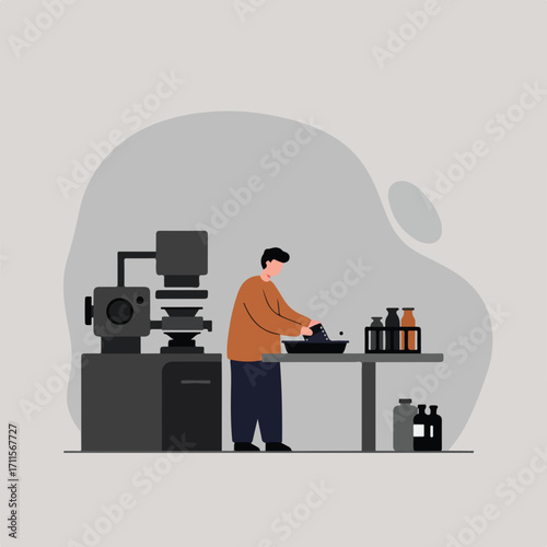 Man works in darkroom, developing photos with chemicals, surrounded by bottles and equipment