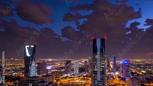 Aerial cityscape of Riyadh, Saudi Arabia, at twilight with modern skyscrapers.