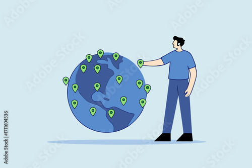 businessman CEO put new branch pin on world map across globe.