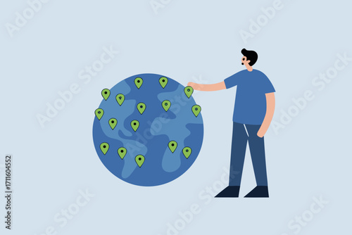 businessman CEO put new branch pin on world map across globe.