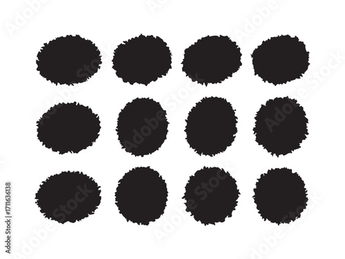 Collection of 12 black distressed textured ink spots and blots artistic design elements