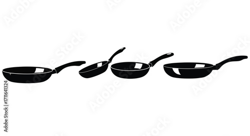 Set of four black mini pans and spoons for cooking and serving food photography vector