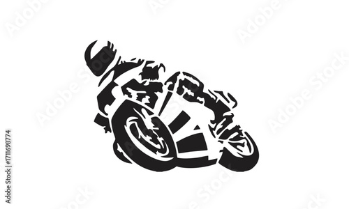Silhouette of a motorcycle racer leaning into a turn on a track.