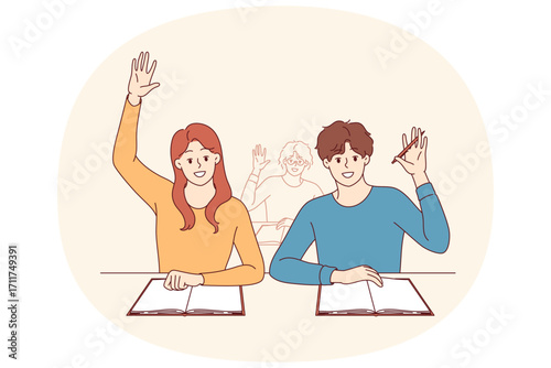 Students receive education, sitting at desks at university and raising hands up. Back to school concept for teenage students enjoying opportunity to gain new knowledge or diploma for college