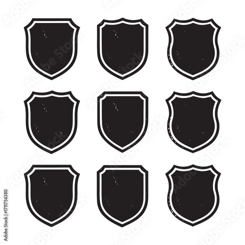 Nine Black Shield Emblems With Textured Outline Variations badge crest