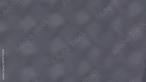 Abstract textured background with subtle pattern and muted color palette