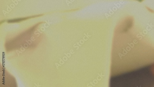 Close up of a person writing on a piece of paper with a pen