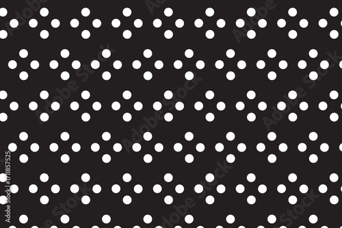 Seamless black and white polka dot vector pattern, retro fabric and wallpaper background.