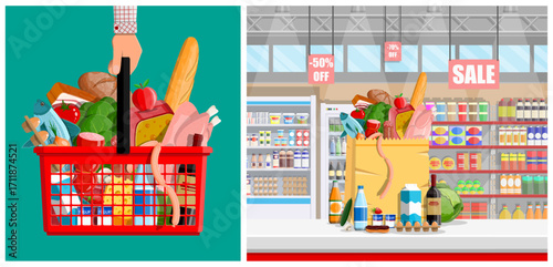 Man hand holding shopping basket full of groceries and paper bag in supermarket. Food retail store sale concept.