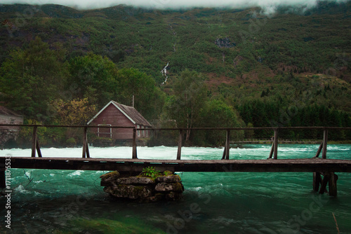 wooden bridge over the river