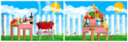 Summer outdoor picnic with food and barbecue grill cooking meat. Family leisure in backyard with fence and green grass field.