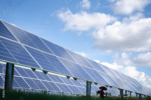 Large ground-mounted solar panel rows with angled design, providing durable renewable energy generation for open-field installations in farms, commercial, and industrial spaces