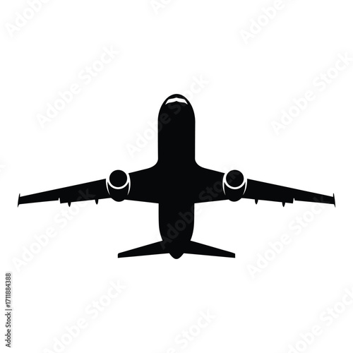 Silhouetted commercial airplane viewed from directly above taking flight silhouette