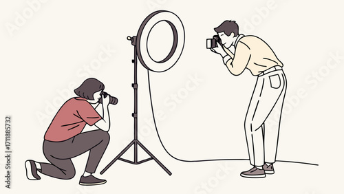 Two Photographers Shooting Photos with Ring Light in Studio.