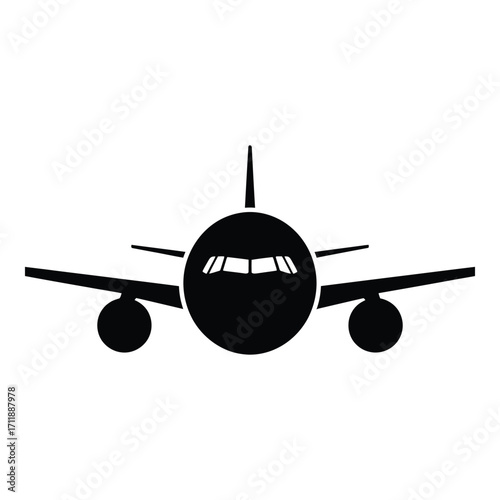 Silhouette of a commercial airplane flying directly towards viewer showing detailed cockpit and wings silhouette