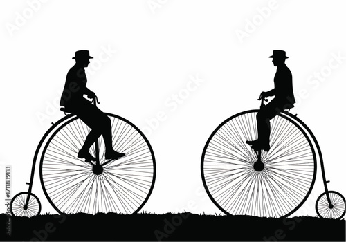 Two Figures Silhouetted on Vintage Penny Farthing Bicycles Illustrating a Classic Era