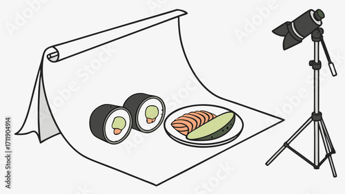 Studio food photography setup with sushi and lighting equipment.