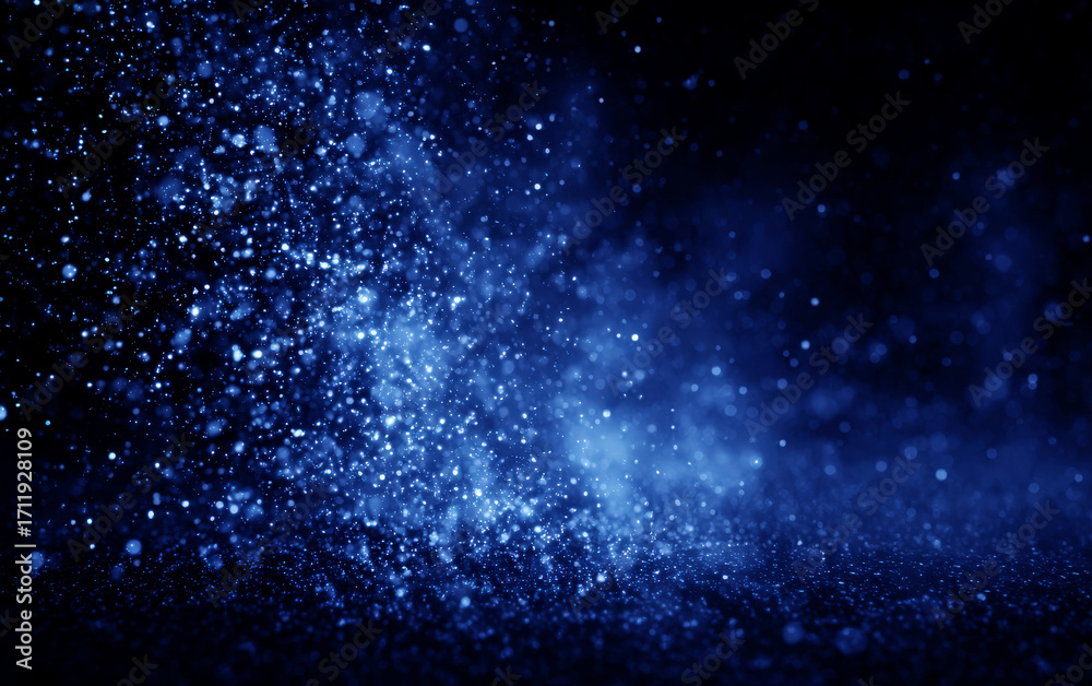 Obraz premium Blue Glitter Particles Flying in the Dark Background