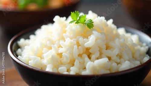 Steaming bowl of fluffy white rice, a staple in Chinese cuisine, perfect as a side dish or base for countless savory meals Close-up shot highlighting the texture and grains , china, eat, healthy