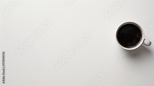 Minimalist office desk with coffee cup and notebook on white background, ideal for graphic design