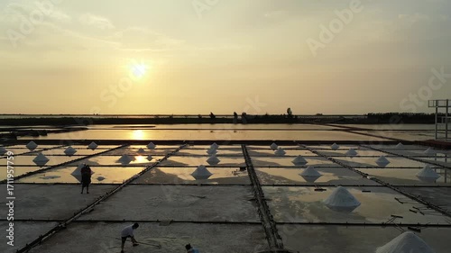 Sunset Reflections over Salt Fields in Taiwan