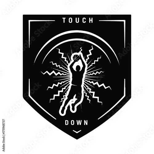 Black and white graphic design of a basketball player dunking, with the words "TOUCH DOWN" in a shield-like shape.