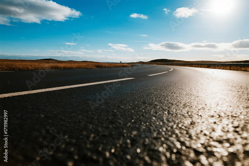 Wallpaper Mural Sunny road with clear blue sky and open landscape Torontodigital.ca