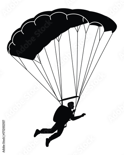 Silhouette of a skydiver descending with a parachute