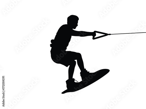 Silhouette of a wakeboarder performing a trick against a white background