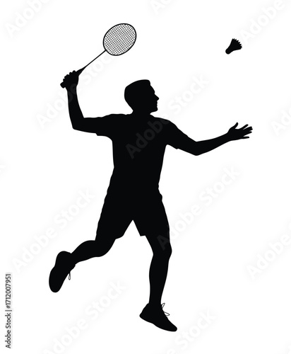 Silhouette of a badminton player in action