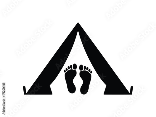 Tent entrance with bare feet inside