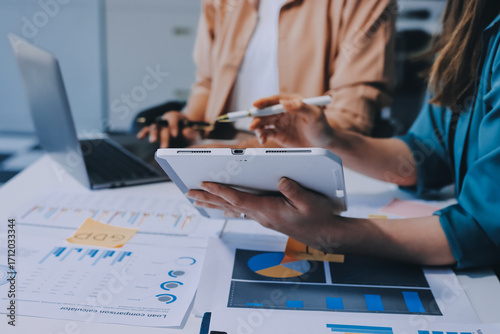 Professional Executive business team brainstorming on meeting to planning investment project working and strategy of business making conversation with partner and consultation of collaboration