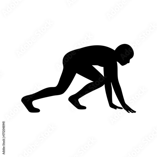 Silhouette of a runner in the starting position ready for the race