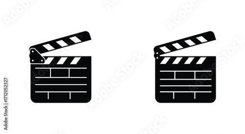 Two black and white film clapperboards side by side isolated on white