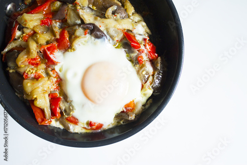 Cooked vegetables with poached egg