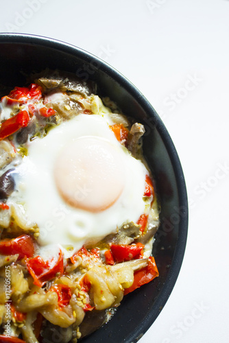 Cooked vegetables with poached egg