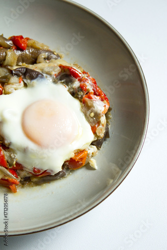 Cooked vegetables with poached egg