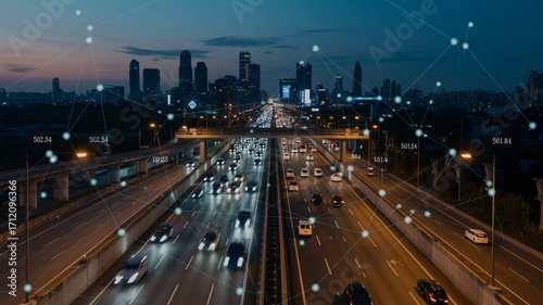 Connected city highway traffic at night with digital network overlay