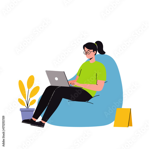 Woman with glasses sits comfortably in a blue beanbag chair, working on a laptop with a plant and a yellow card nearby.