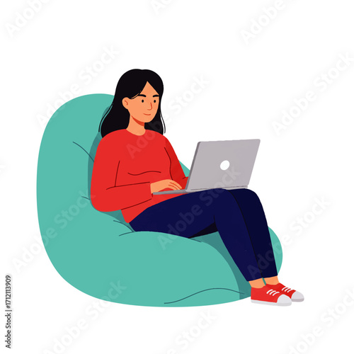 A woman sits comfortably in a beanbag chair while working on a laptop computer.