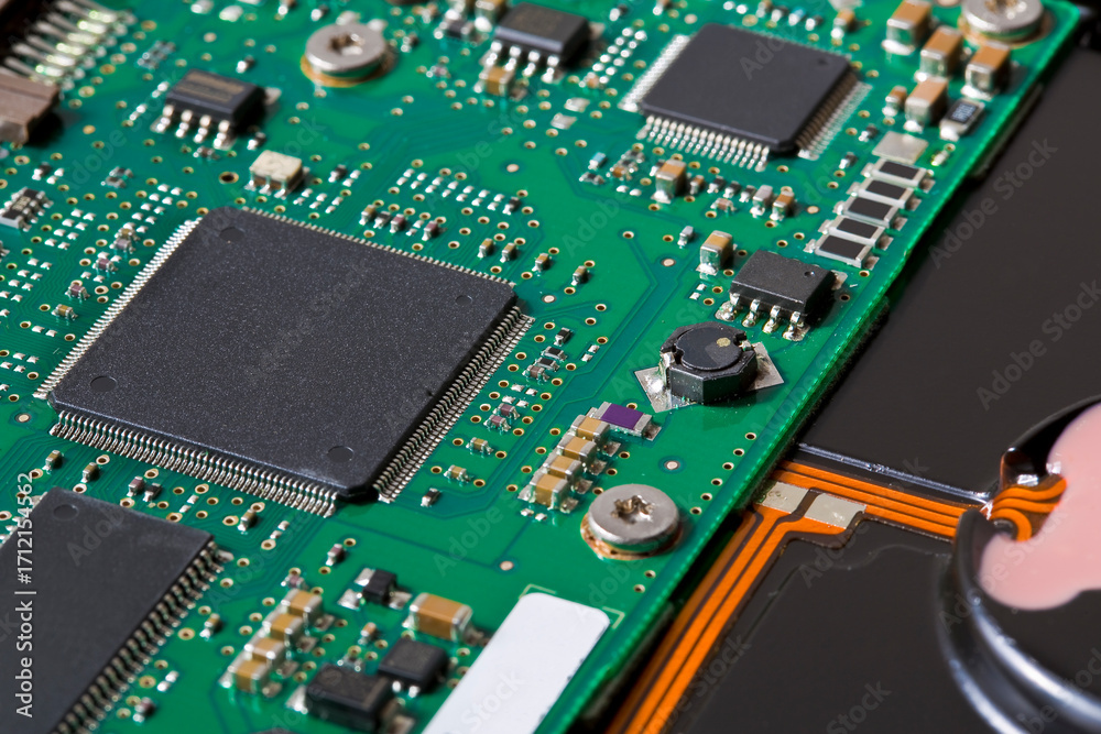 Obraz premium Hard drive with electronic componensts detail.
