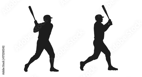 Silhouettes of baseball players in mid swing action a dynamic sporting scene