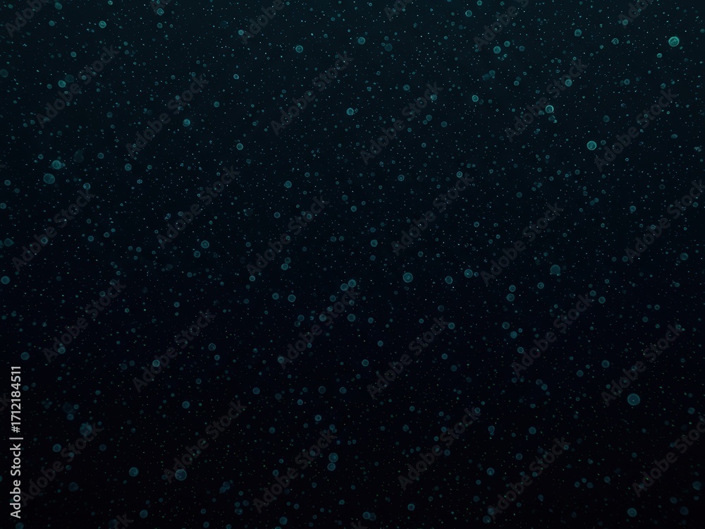 Obraz premium A dark, deep teal background densely covered with numerous small, shimmering blue-green circular particles, resembling underwater bubbles or stardust.