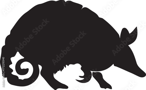 Armadillo silhouette walking, distinctive curled tail