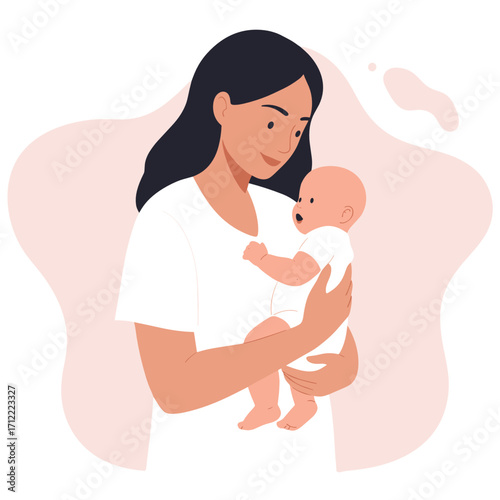 Young woman holding and caring for her baby in a soft background  