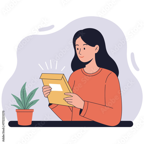 Young woman smiling while opening a package at home with plant  